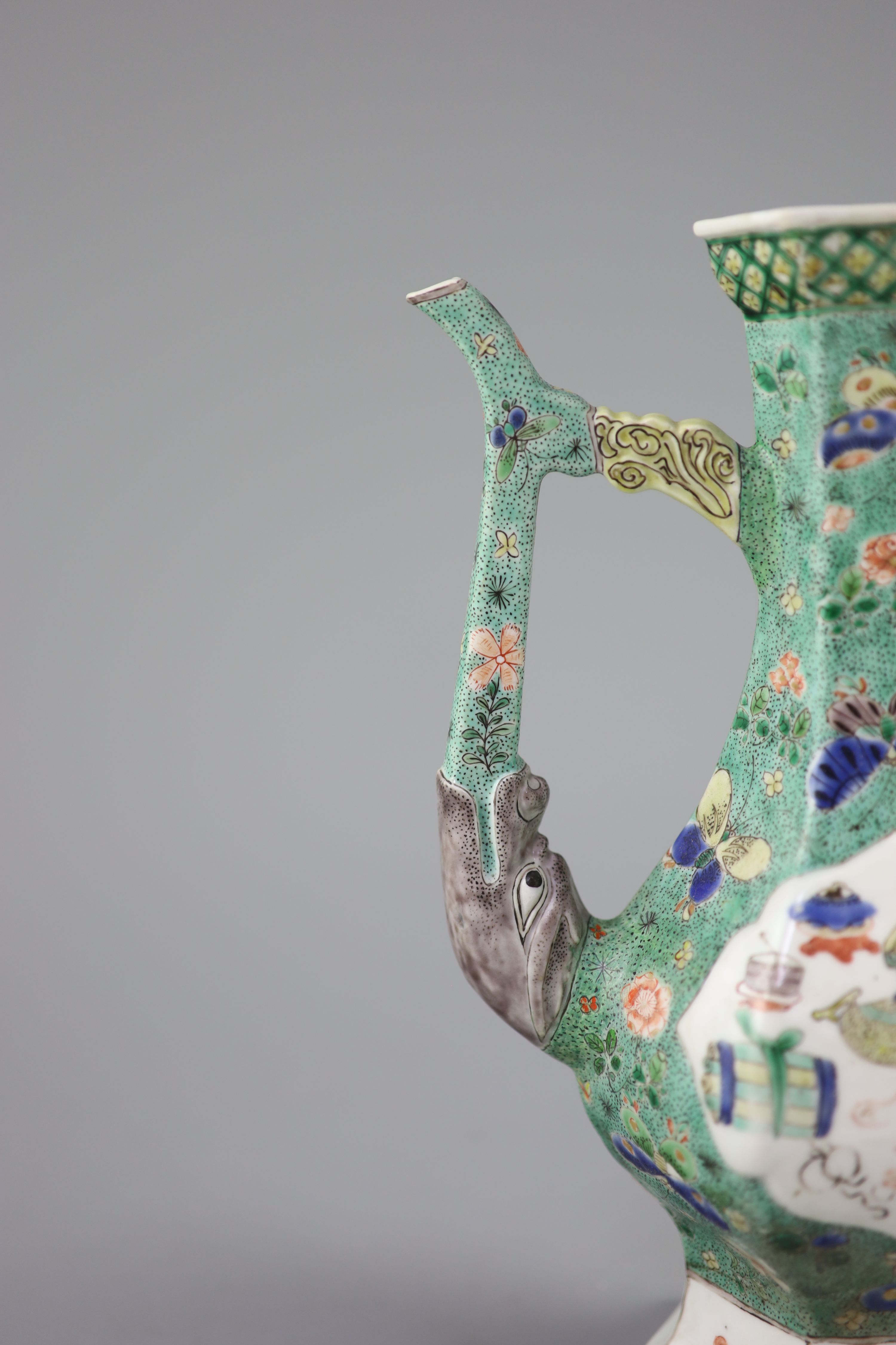 A Chinese famille verte hexagonal wine ewer, Kangxi period (1662-1722), 26cm high, restorations